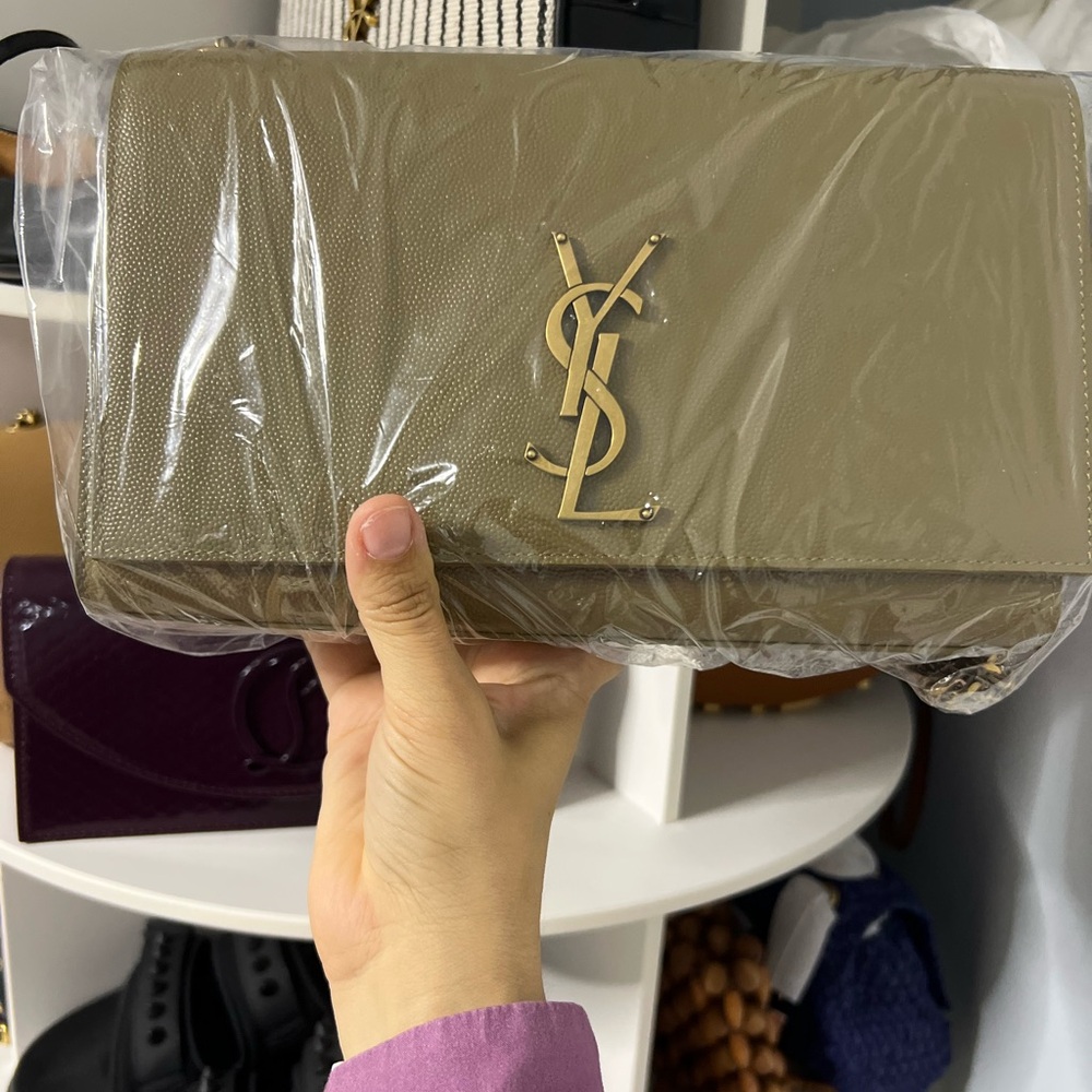 Yves Saint Laurent Tan Clutch with Gold Logo